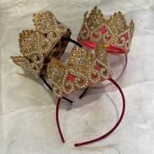 Load image into Gallery viewer, A beautiful Gold and pearl crown. In gold, flat ivory pearls. perched on top of a flexible Alice band.