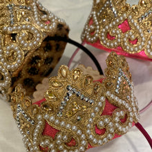 Load image into Gallery viewer, A beautiful Gold and pearl crown. In gold, flat ivory pearls. perched on top of a flexible Alice band.